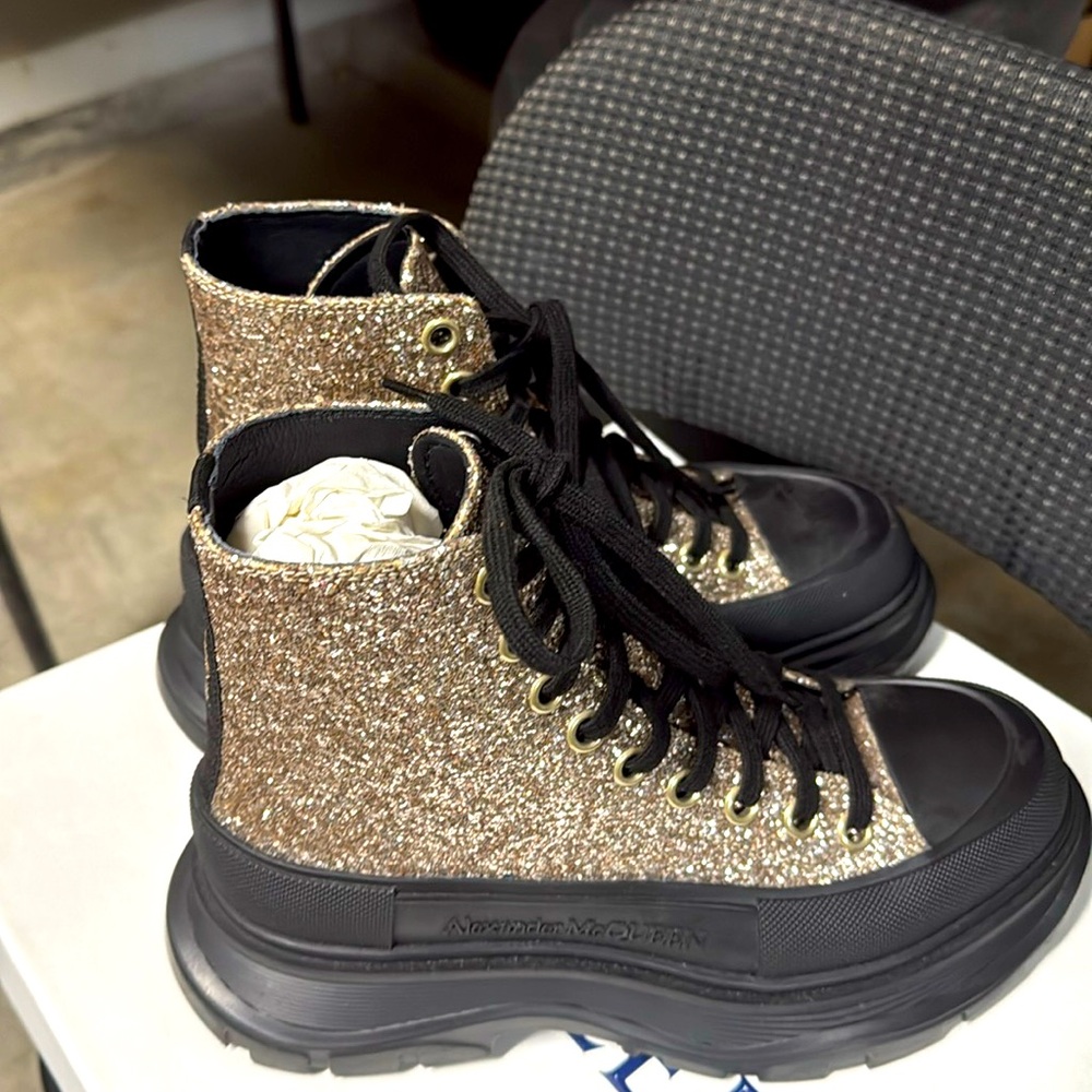 Alexander McQueen hi top glitter sneakers in size 38 1/2 in pristine condition.
